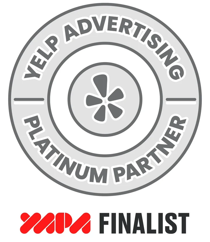 Yelp Advertising Platinum Partner badge with the YAPA Finalist mark (Yelp Advertising Partner Awards)